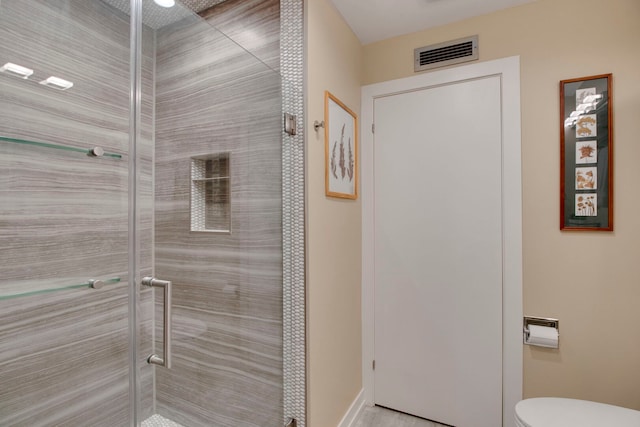 241 E Burlington St Unit C, Riverside, IL 60546 - full bath with a shower stall, toilet, and baseboards