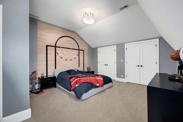 31 Concord Dr, Oak Brook, IL 60523 - bedroom with multiple closets, lofted ceiling, carpet floors, and baseboards