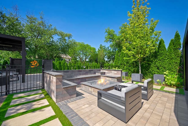 31 Concord Dr, Oak Brook, IL 60523 - view of patio / terrace with a fire pit and fence