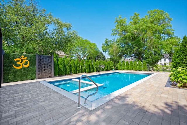31 Concord Dr, Oak Brook, IL 60523 - view of pool featuring an in-ground hot tub, fence, and a patio area