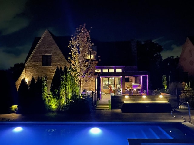 31 Concord Dr, Oak Brook, IL 60523 - pool at twilight with an outdoor pool and a patio area