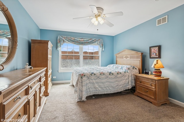 bedroom with baseboards, light carpet, and ceiling fan