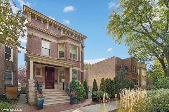 4845 N Bell Ave, Chicago, IL 60625 - italianate-style house featuring brick siding and covered porch