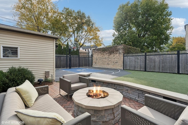 4845 N Bell Ave, Chicago, IL 60625 - view of patio with an outdoor living space with a fire pit and basketball hoop