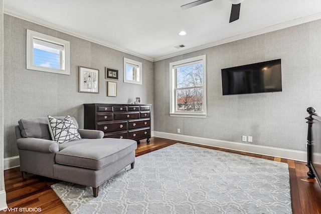 4845 N Bell Ave, Chicago, IL 60625 - living area with crown molding, wood finished floors, a ceiling fan, and baseboards