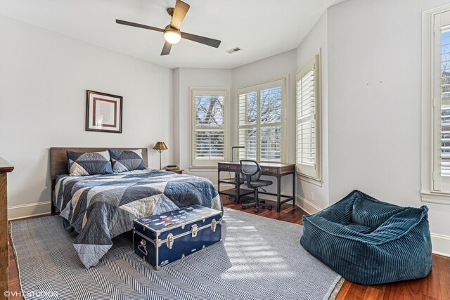 4845 N Bell Ave, Chicago, IL 60625 - bedroom with wood finished floors, baseboards, and ceiling fan