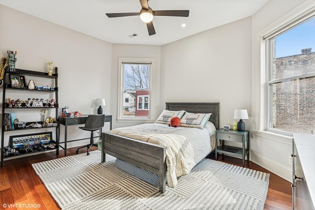 4845 N Bell Ave, Chicago, IL 60625 - bedroom featuring multiple windows, wood finished floors, recessed lighting, baseboards, and a ceiling fan