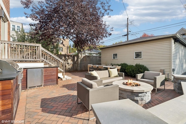 4845 N Bell Ave, Chicago, IL 60625 - view of patio with fence, an outdoor living space with a fire pit, and area for grilling