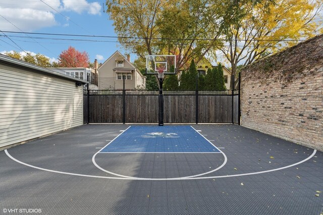 4845 N Bell Ave, Chicago, IL 60625 - view of sport court with basketball court and fence