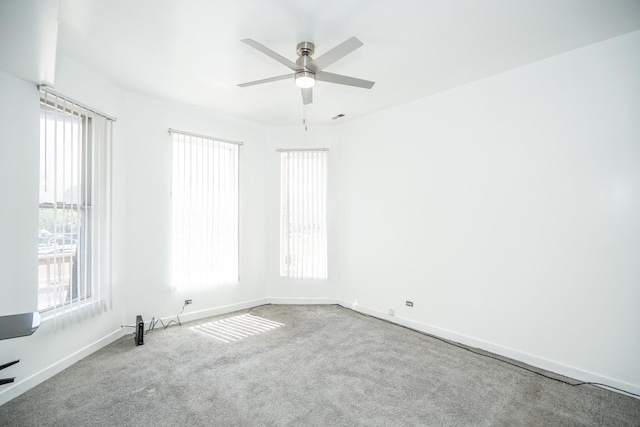 3929 W Arthington St, Chicago, IL 60624 - spare room featuring carpet flooring, ceiling fan, and baseboards