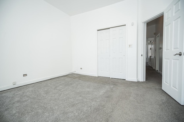3929 W Arthington St, Chicago, IL 60624 - unfurnished bedroom with carpet, baseboards, and a closet
