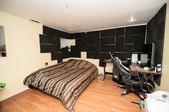 3929 W Arthington St, Chicago, IL 60624 - bedroom with light wood-style flooring, a desk, and baseboards