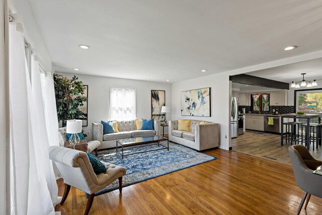 785 E 164th St, South Holland, IL 60473 - living room featuring wood finished floors, recessed lighting, and a chandelier