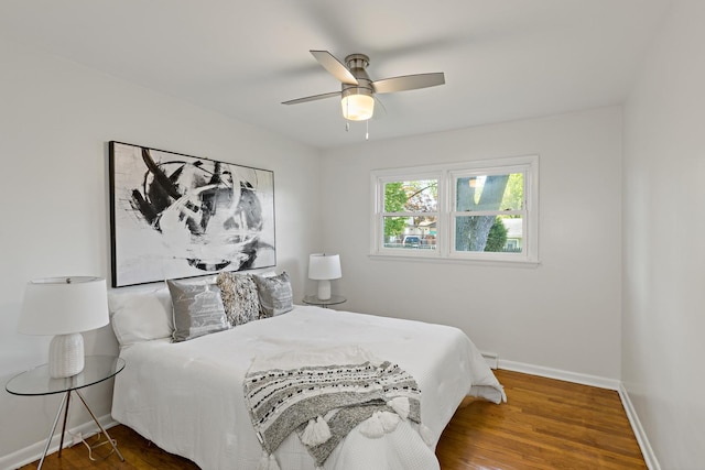 785 E 164th St, South Holland, IL 60473 - bedroom featuring wood finished floors, baseboards, and ceiling fan