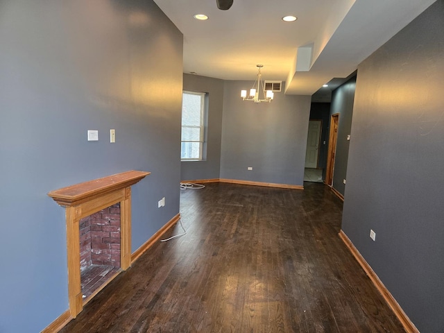 948 N California Ave, Chicago, IL 60622 - unfurnished room with a chandelier, wood finished floors, baseboards, and recessed lighting