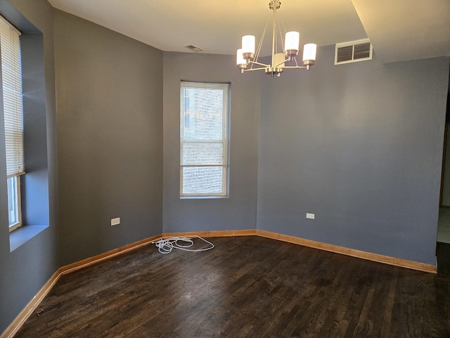948 N California Ave, Chicago, IL 60622 - unfurnished room featuring a chandelier, dark wood-style floors, and baseboards