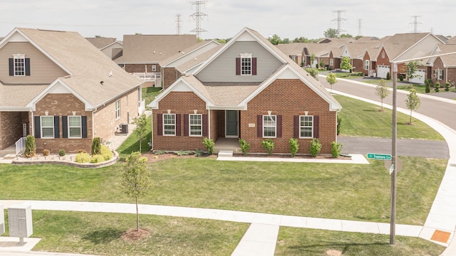 2107 Traemore Ln, New Lenox, IL 60451 - traditional home with brick siding, a residential view, and a front lawn