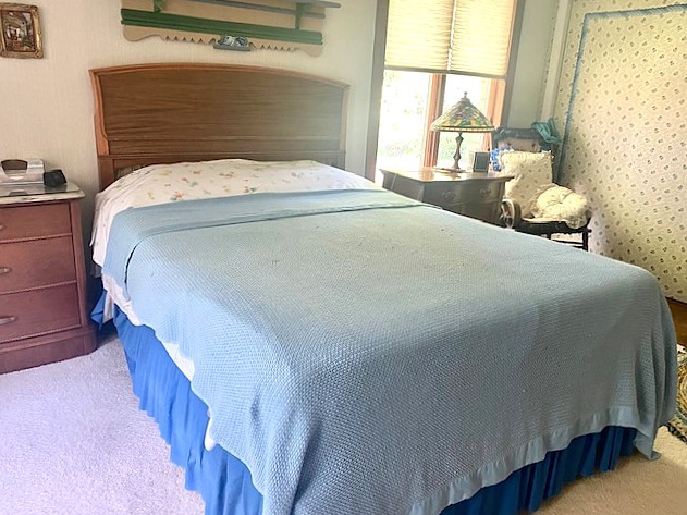 bedroom featuring carpet