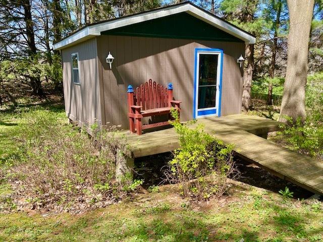 view of outbuilding with an outdoor structure