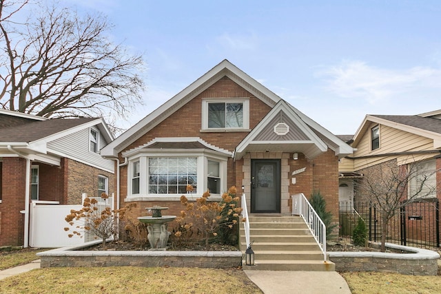 3305 W 66th St, Chicago, IL 60629 - view of front of house with brick siding and fence