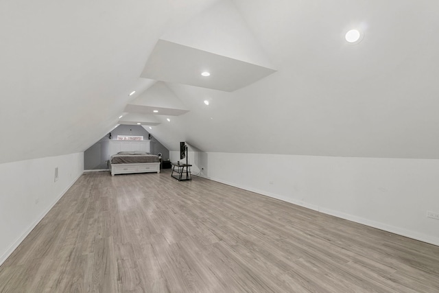 3305 W 66th St, Chicago, IL 60629 - additional living space with lofted ceiling, light wood finished floors, recessed lighting, and baseboards