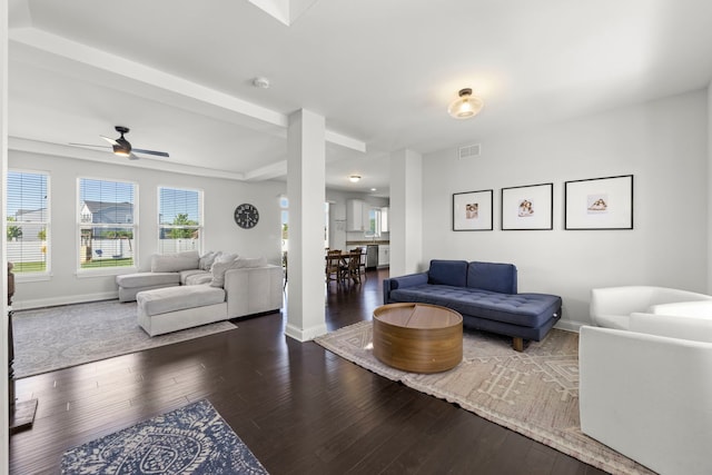2319 Coventry Cir, Sycamore, IL 60178 - living room featuring baseboards, dark wood-style flooring, and a ceiling fan