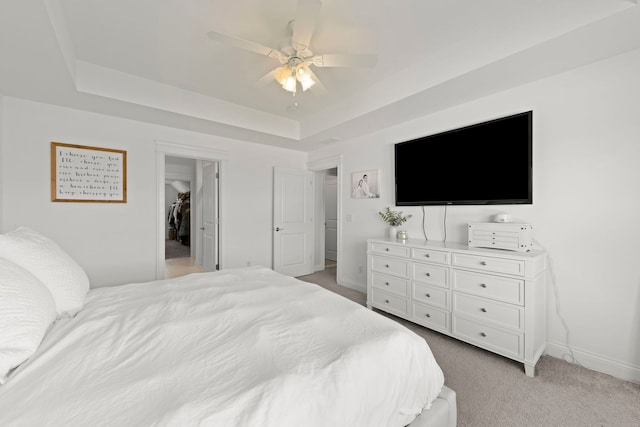 2319 Coventry Cir, Sycamore, IL 60178 - bedroom featuring a raised ceiling, light carpet, baseboards, and ceiling fan