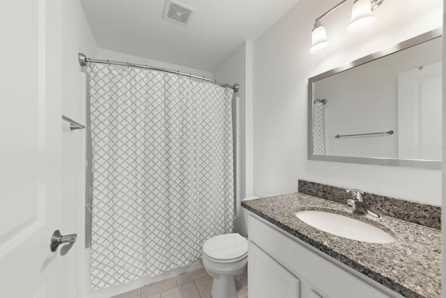 2319 Coventry Cir, Sycamore, IL 60178 - full bathroom featuring toilet, vanity, tile patterned flooring, and curtained shower