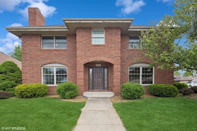 18321 Country Ln, Lansing, IL 60438 - view of front of property with a chimney, brick siding, and a front yard