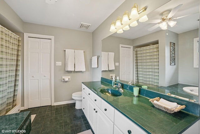 18321 Country Ln, Lansing, IL 60438 - full bathroom with tile patterned floors, ceiling fan, vanity, baseboards, and toilet
