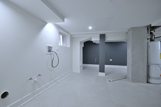 basement with water heater and baseboards