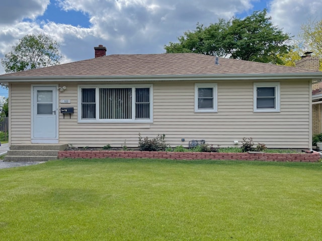 1908 Linden Ave, Waukegan, IL 60087 - ranch-style home with a chimney, a front yard, entry steps, and a shingled roof