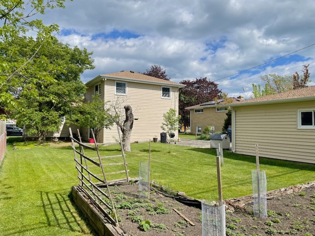 1908 Linden Ave, Waukegan, IL 60087 - view of green lawn featuring a garden