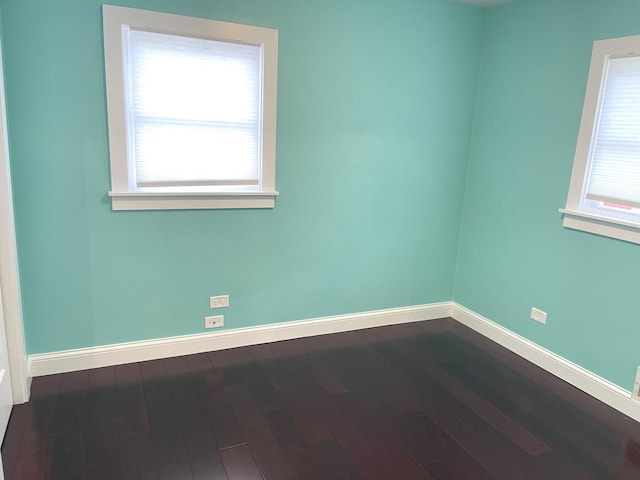 1908 Linden Ave, Waukegan, IL 60087 - spare room featuring baseboards and dark wood finished floors