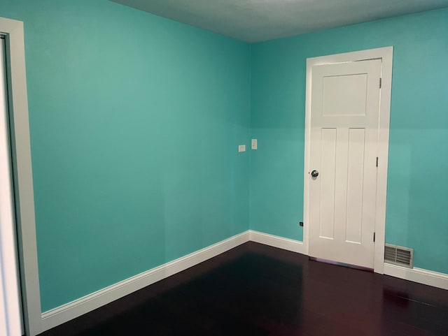 1908 Linden Ave, Waukegan, IL 60087 - spare room featuring dark wood-style floors and baseboards