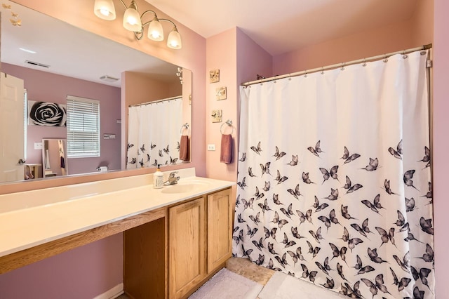 614 Grand Canyon Cir, Crystal Lake, IL 60014 - full bathroom with vanity, curtained shower, and tile patterned flooring