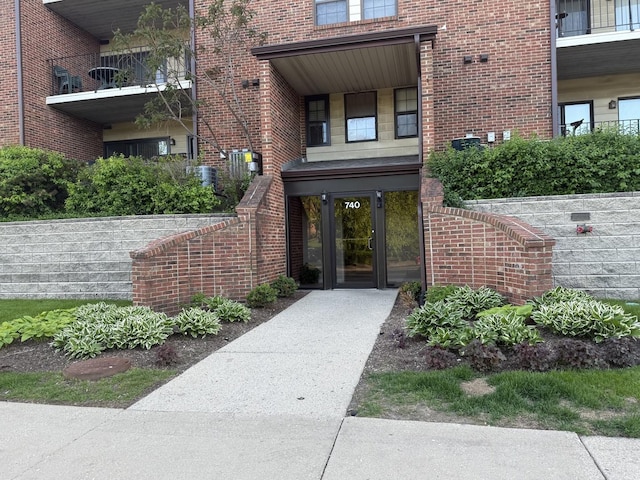 740 Weidner Rd Unit 206, Buffalo Grove, IL 60089 - view of exterior entry with brick siding