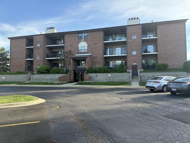 740 Weidner Rd Unit 206, Buffalo Grove, IL 60089 - view of apartment building / complex with uncovered parking