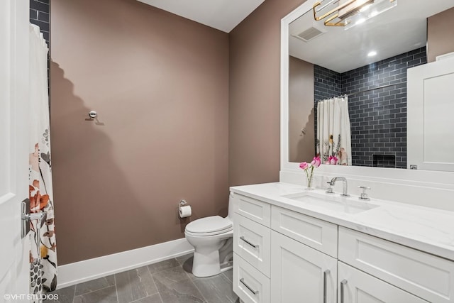 full bath featuring toilet, baseboards, vanity, and a shower with shower curtain