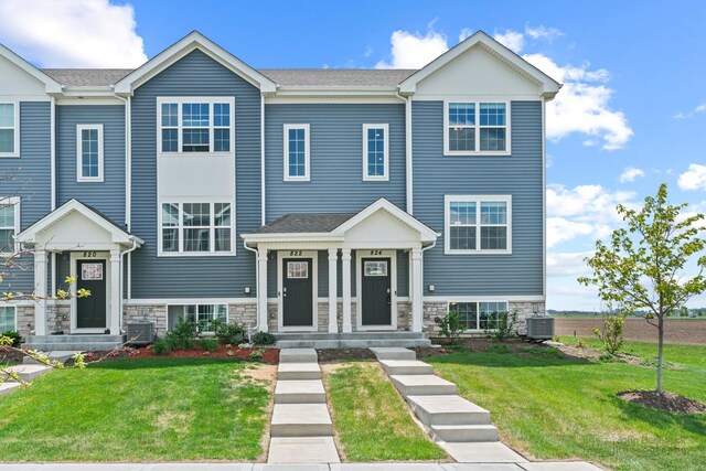 824 Briar Glen Ct, Hampshire, IL 60140 - view of front of home featuring central AC, a front lawn, and stone siding