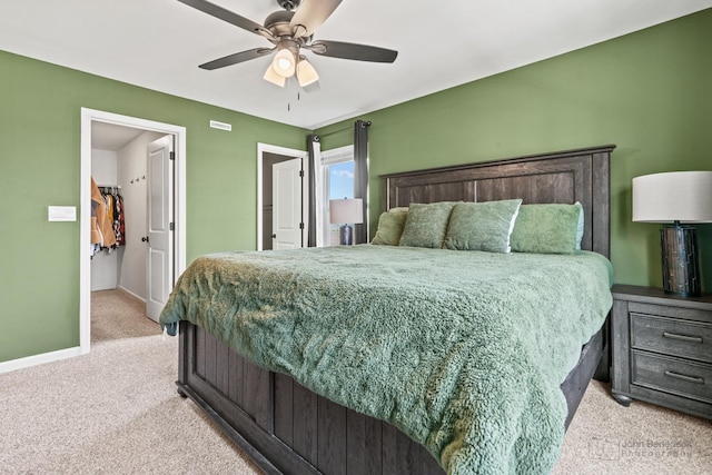 824 Briar Glen Ct, Hampshire, IL 60140 - bedroom with light carpet, baseboards, a ceiling fan, and a spacious closet
