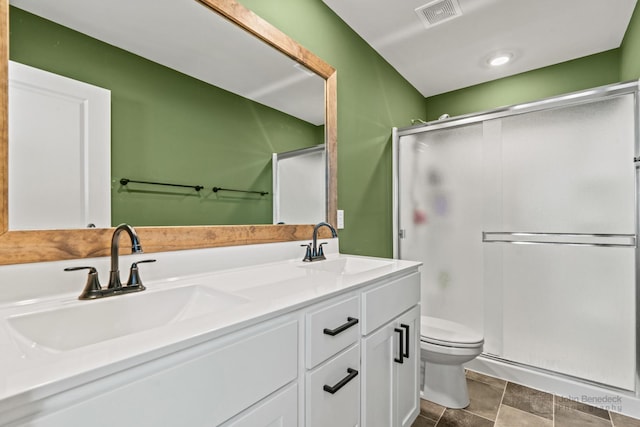 824 Briar Glen Ct, Hampshire, IL 60140 - bathroom with a shower stall, toilet, and double vanity