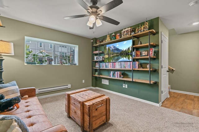 824 Briar Glen Ct, Hampshire, IL 60140 - living room with baseboard heating, carpet flooring, ceiling fan, baseboards, and recessed lighting