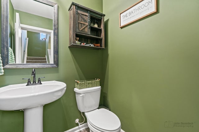 824 Briar Glen Ct, Hampshire, IL 60140 - bathroom with toilet, baseboards, and a sink