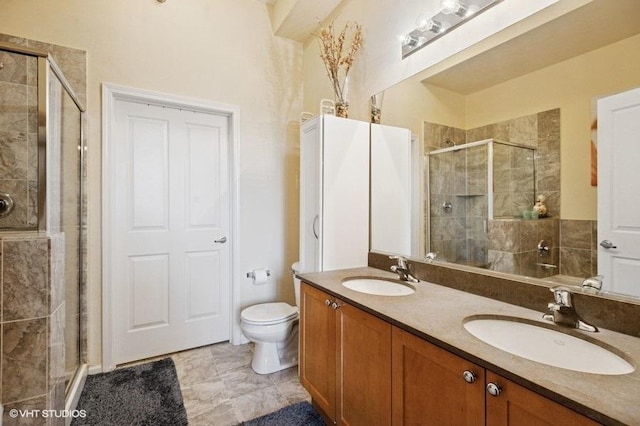 1464 S Michigan Ave Unit 703, Chicago, IL 60605 - full bathroom featuring a shower stall, double vanity, and toilet
