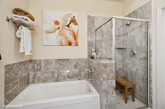 1464 S Michigan Ave Unit 703, Chicago, IL 60605 - full bathroom featuring a stall shower and a garden tub