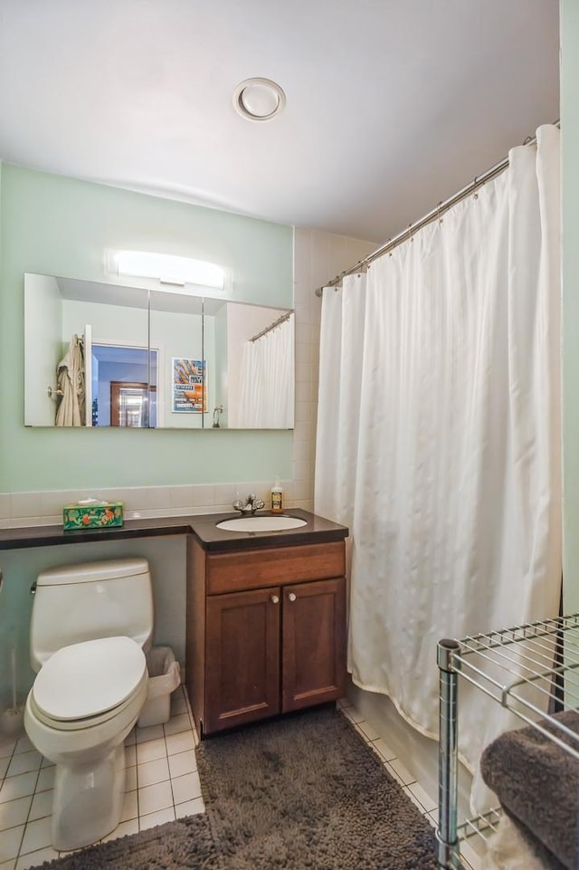400 E Randolph St Unit 3918, Chicago, IL 60601 - full bathroom featuring tile patterned floors, toilet, vanity, and curtained shower