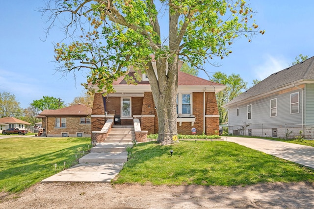 103 Grandview Ave, Lockport, IL 60441 - view of front of house with brick siding and a front lawn