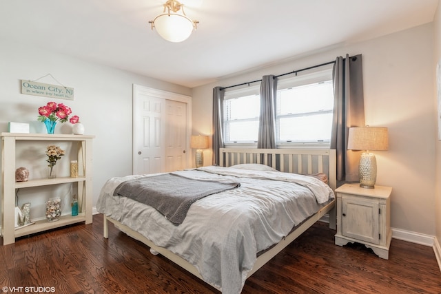 1080 E Prairie Ave, Des Plaines, IL 60016 - bedroom with dark wood finished floors, baseboards, and a closet