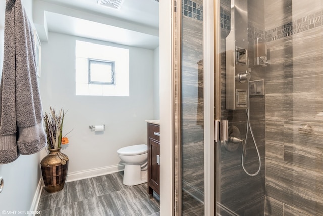 1080 E Prairie Ave, Des Plaines, IL 60016 - full bathroom with vanity, tiled shower, toilet, and baseboards